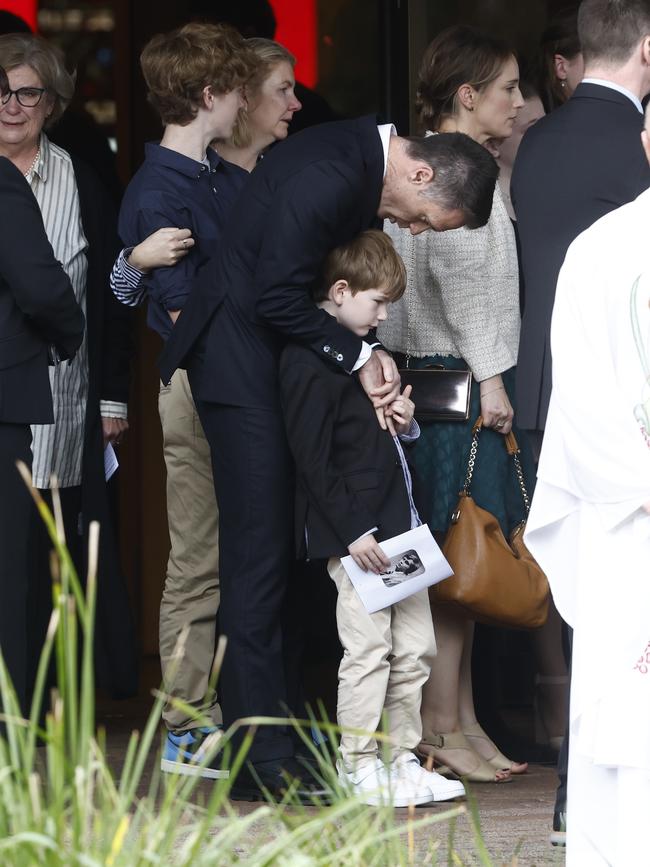 Premier Chris Minns with his youngest son George. Picture: Richard Dobson