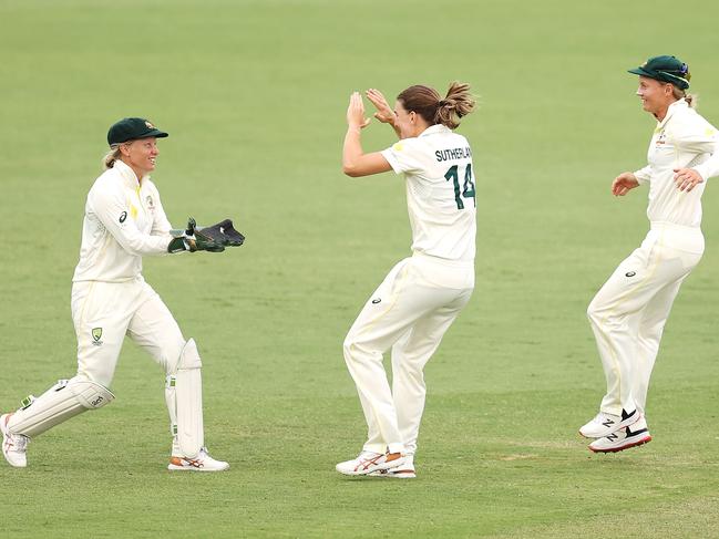 Alyssa Healy, Annabel Sutherland and Meg Lanning celebrate the wicket of England’s Katherine Brunt during the fourth day of the thrilling Test Match. Picture: Getty Images