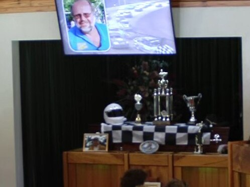 A coffin draped in a checkered flag and adorned with trophies helped honour Steve’s memory and passion for racing.