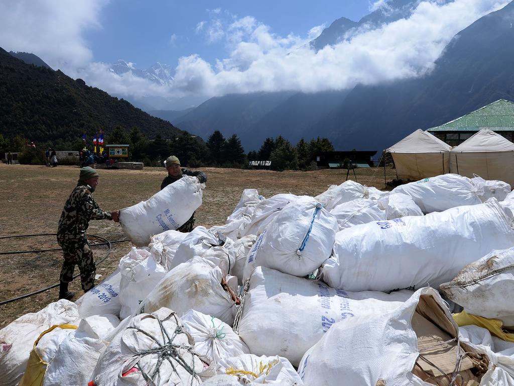 Nepali Army personnel collect waste from Mount Everest at Namche Bazar in Solukhumbu district. Picture: AFP