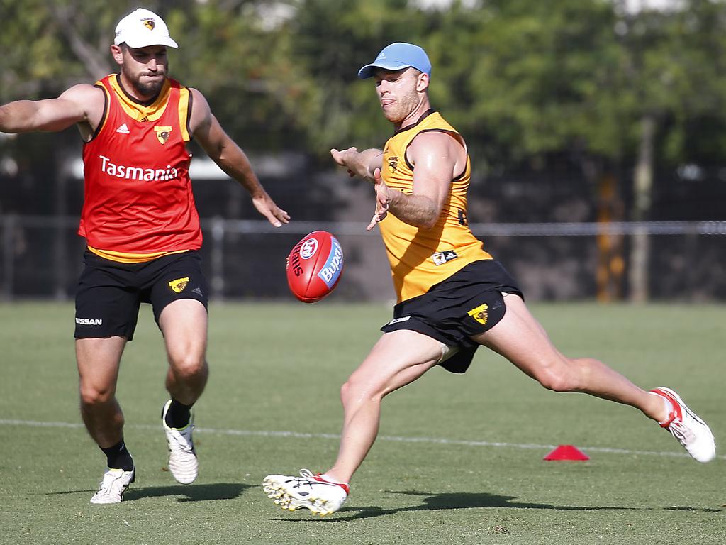 Tom Mitchell kicking on the run at pre-season training on Friday. Picture: Ian Currie