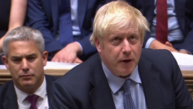 A video grab from footage broadcast by the UK Parliament's Parliamentary Recording Unit (PRU) shows Britain's Prime Minister Boris Johnson as he  speaks to move a motion to hold an early parliamentary general election, in the House of Commons in London on September 4, 2019. - British Prime Minister Boris Johnson on Wednesday called for parliament to vote in favour of holding early elections after MPs dealt a major blow against his Brexit strategy. (Photo by - / PRU / AFP) / RESTRICTED TO EDITORIAL USE - MANDATORY CREDIT " AFP PHOTO / PRU " - NO USE FOR ENTERTAINMENT, SATIRICAL, MARKETING OR ADVERTISING CAMPAIGNS - EDITORS NOTE THE IMAGE HAS BEEN DIGITALLY ALTERED AT SOURCE TO OBSCURE VISIBLE DOCUMENTS