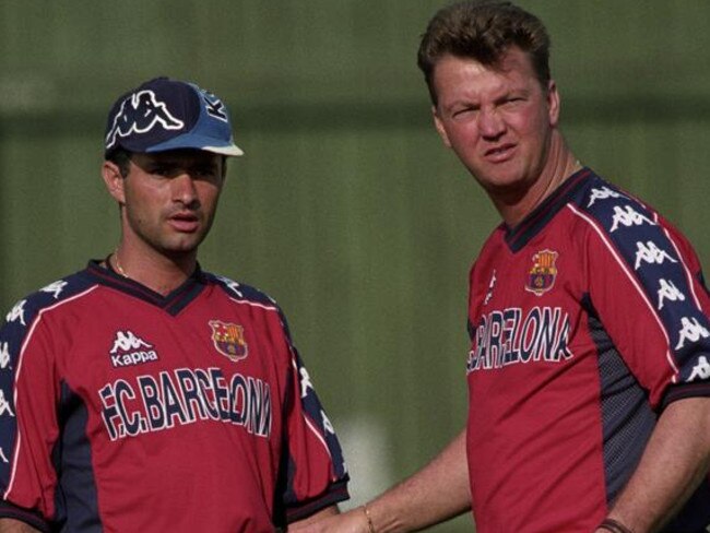 A young Jose Mourinho (L) with Louis van Gaal at Barcelona in 1997.