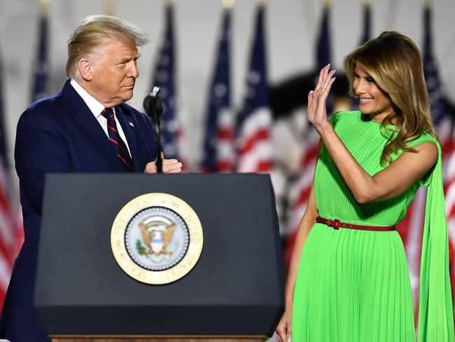 ‘Your vote will decide.’ President Donald Trump and his wife Melania Trump on stage at the Republican National Convention, held outside the White House. Picture: AFP