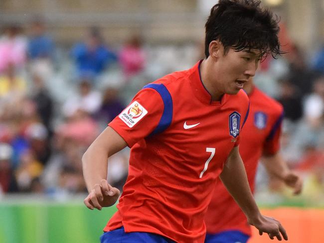 Son Heung Min of South Korea in action during the first round Asian Cup football match between South Korea and Oman in Canberra on January 10, 2015. AFP PHOTO / MARK GRAHAM --- IMAGE RESTRICTED TO EDITORIAL USE - STRICTLY NO COMMERICAL USE --