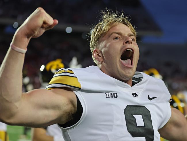 MADISON, WISCONSIN - OCTOBER 14: Tory Taylor #9 of the Iowa Hawkeyes celebrates after the Hawkeyes defeated the Wisconsin Badgers at Camp Randall Stadium on October 14, 2023 in Madison, Wisconsin. (Photo by Stacy Revere/Getty Images)