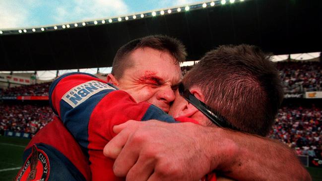 Paul Harragon celebrates after the 1997 grand final win.