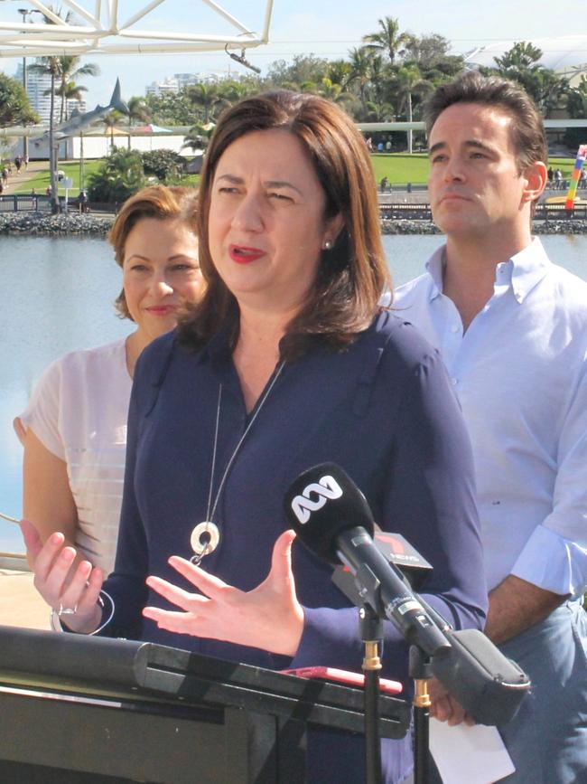 Queensland Premier Annastacia Palaszczuk with Deputy Premier Jackie Trad and Village Roadshow Theme Parks chief executive Clark Kirby at Sea World on Saturday.