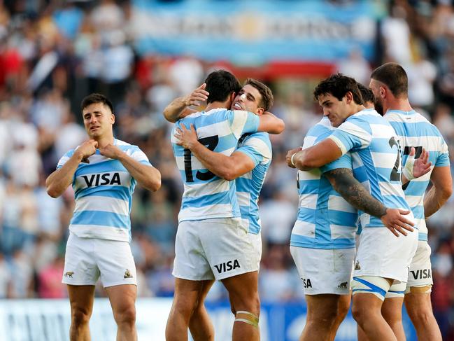 Argentina players celebrate their victory. Picture: GERONIMO URANGA / AFP