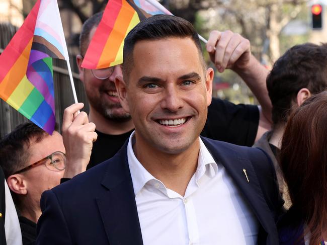 SYDNEY, AUSTRALIA - NewsWire Photos AUGUST 24, 2023:  LGBTIQA+ community members and Independent Sydney MP Alex Greenwich pictured with liberal MP Felicity Wilson outside Parliament House.Picture: NCA NewsWire / Damian Shaw