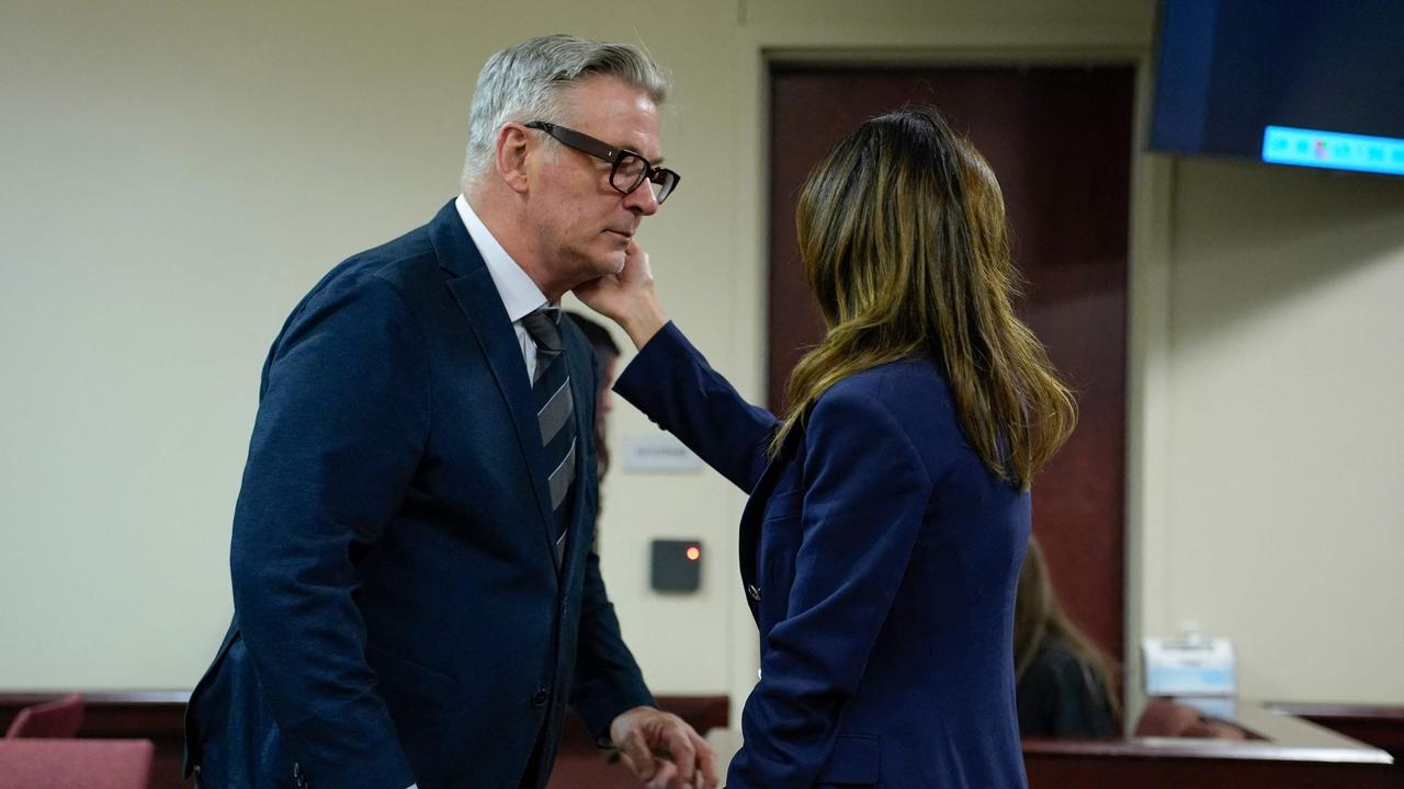 Alec Baldwin with his wife Hilaria in court after he was acquitted for involuntary manslaughter. Picture: AFP