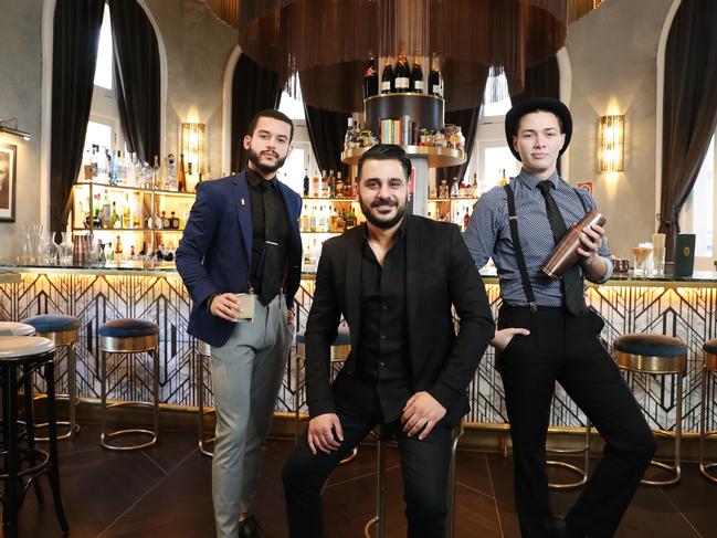 Darlinghurst’s The Cat's Meow: Bar owner Henri Azzi (centre) with manager Kau Sampaio and head bartender Dante Davies. Picture: Rohan Kelly