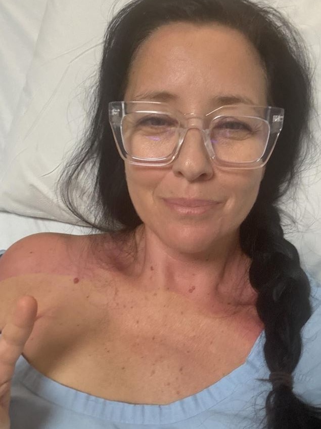 Ali Clarke in hospital after her first breast cancer surgery. Picture: Instagram