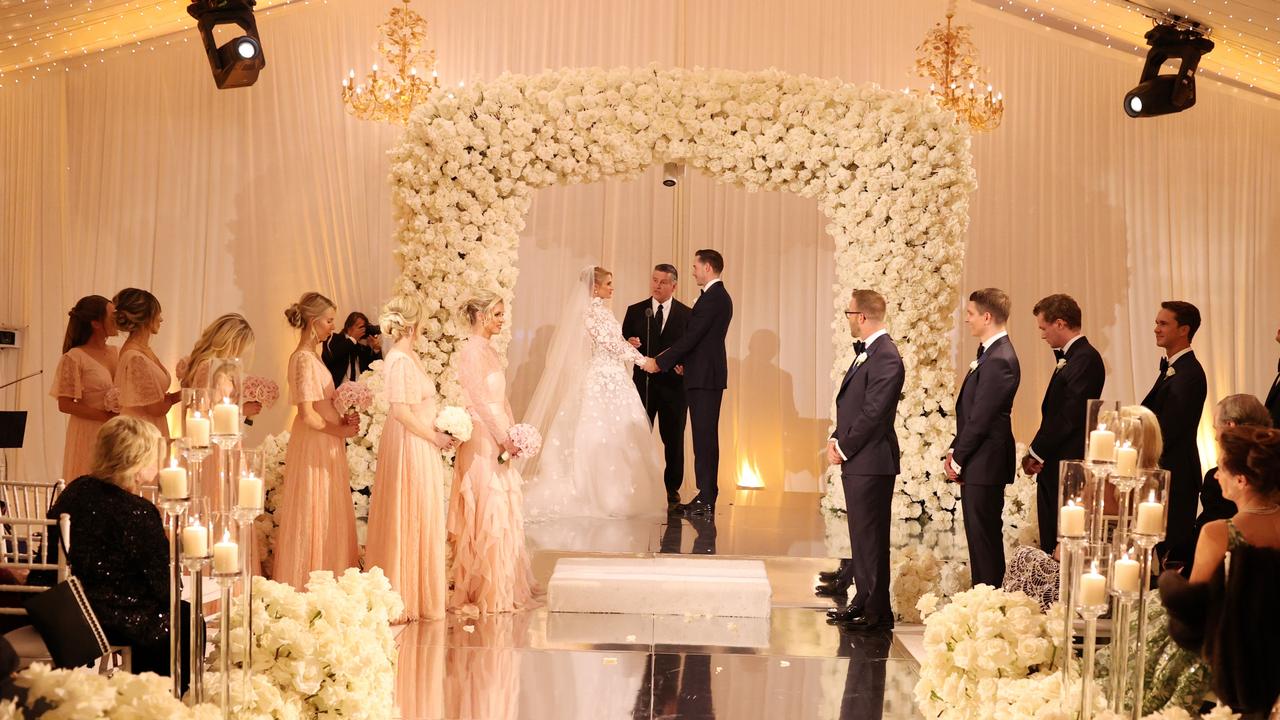 See Paris Hilton's wedding dress and three reception looks