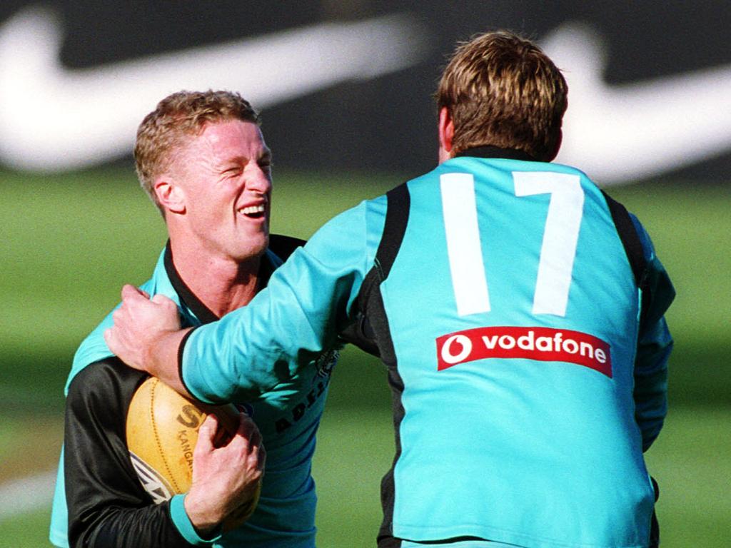 Damien Hardwick and Stuart Dew are premiership teammates at Port Adelaide.