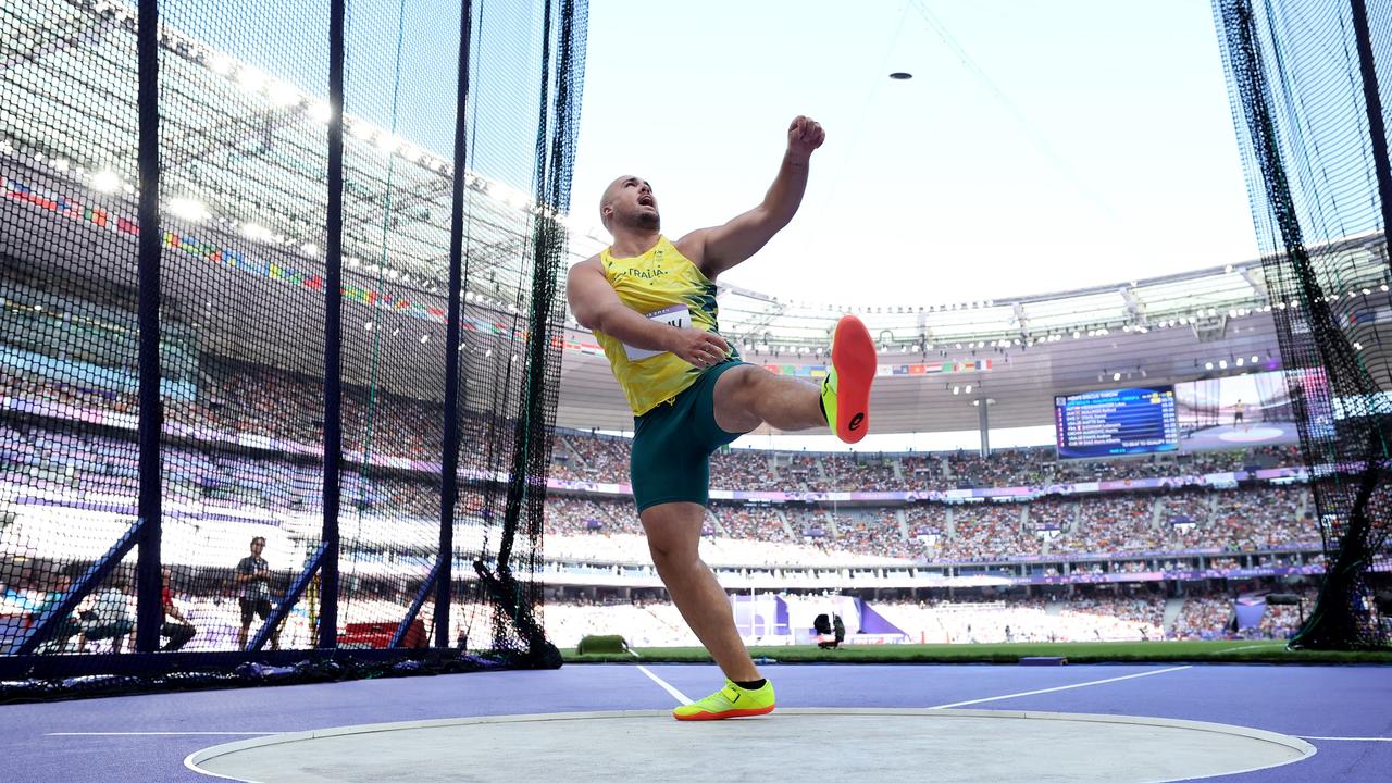 Matthew Denny throws in the men’s discus qualifying stage in Paris. Picture: Getty Images