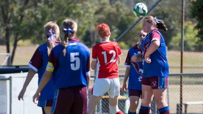 Action from the under 15/16 girls Queensland Christian Soccer Association grand final between Blackstone and Brisbane Valley. Picture: Gary Reid