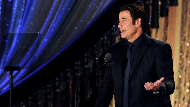 John Travolta, seen here at a Scientology gala, gives a maudlin performance in <i>The Forger</i>. Picture: Getty Images