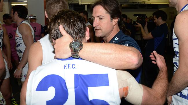 Bulldogs coach Luke Beveridge celebrates with Caleb Daniel. Picture: Daniel Wilkins