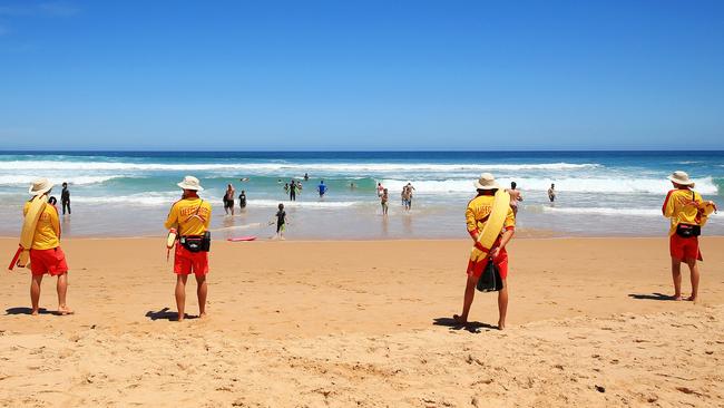 Swimmers enjoy the water between the flags at Cape Woolamai surf beach. Picture: Mark Stewart