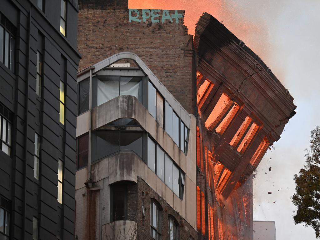 The building collapses after the fire took hold. Picture: Dean Lewins/AAP