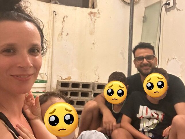 Emily Gian and her family sheltering in their bunker. Picture: Twitter @emilygian