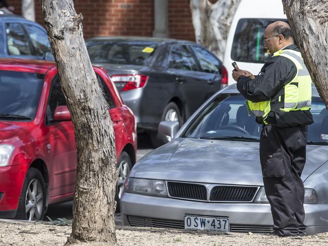 Parking inspectors are cracking down on drivers who try to transfer their parking ticket.