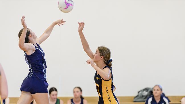 Makayla Ireland (left) of St Ursula's defends against Sophie McMaster of Fairholme in the Laura Geitz Cup netball carnival at The Glennie School, Sunday, March 16, 2025. Picture: Kevin Farmer