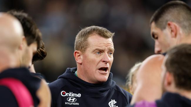 MELBOURNE, AUSTRALIA – MAY 03: Michael Voss, Senior Coach of the Blues addresses his players during the 2024 AFL Round 08 match between the Carlton Blues and the Collingwood Magpies at The Melbourne Cricket Ground on May 03, 2024 in Melbourne, Australia. (Photo by Dylan Burns/AFL Photos via Getty Images)