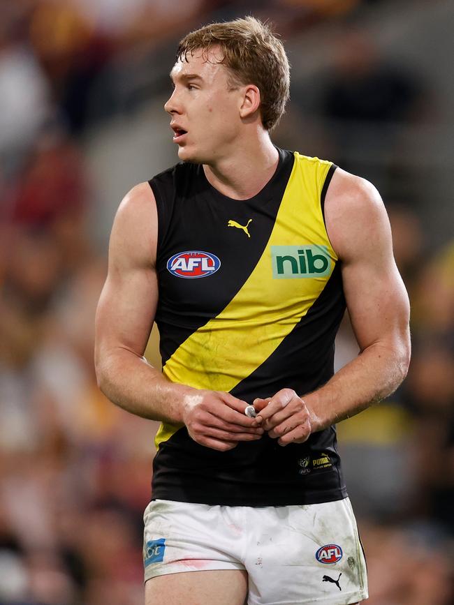 Tom J. Lynch looks on as the decision is reviewed. Picture: Michael Willson/AFL Photos via Getty Images