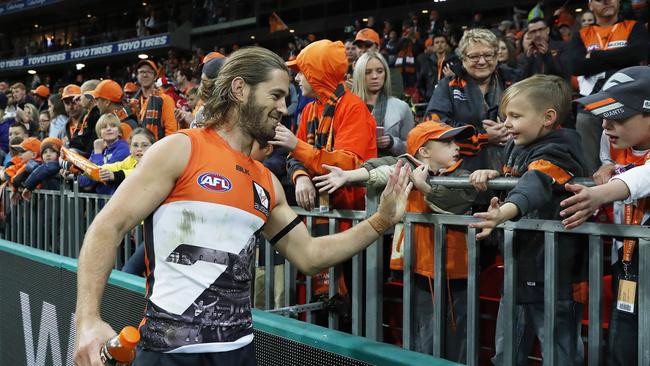 Giants Callan celebrates with fans after Sunday’s win over Sydney in front of a sellout crowd at Spotless Stadium. Picture. Phil Hillyard