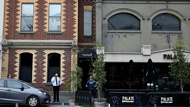 Police inspect the front of Boutique Night Club. Picture: Tim Carrafa