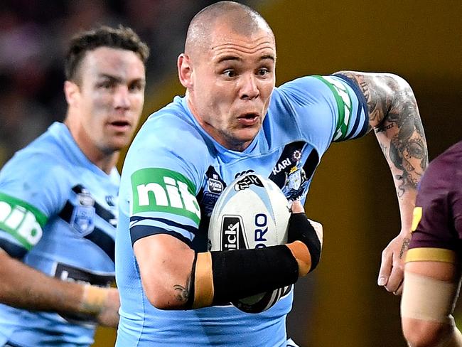 BRISBANE, AUSTRALIA - JULY 11:  David Klemmer of the Blues takes on the defence during game three of the State of Origin series between the Queensland Maroons and the New South Wales Blues at Suncorp Stadium on July 11, 2018 in Brisbane, Australia.  (Photo by Bradley Kanaris/Getty Images)