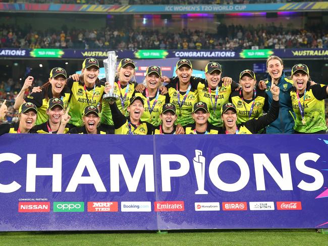 MELBOURNE, AUSTRALIA - MARCH 08: Australia celebrate after winning the ICC Women's T20 Cricket World Cup Final match between India and Australia at the Melbourne Cricket Ground on March 08, 2020 in Melbourne, Australia. (Photo by Cameron Spencer/Getty Images) *** BESTPIX ***