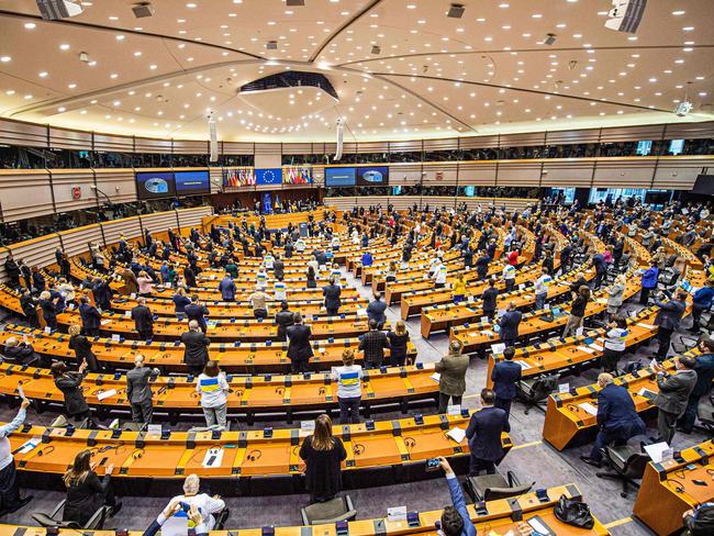 Parliament members give a standing ovation after a live video address of Ukrainian President Volodymyr Oleksandrovytsj Zelensky. Picture: AFP