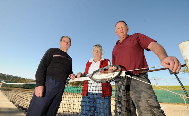 Lights Tennis Club’s Jeff Kennedy, secretary Val Hollands, and president Chris Bromleyare not happy Lismore City Council wants to do away with the old courts for a new development. Picture: Doug Eaton