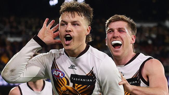 ADELAIDE, AUSTRALIA - JULY 28: Jack Ginnivan of the Hawks celebrates a goal with Dylan Moore during the 2024 AFL Round 20 match between the Adelaide Crows and the Hawthorn Hawks at Adelaide Oval on July 28, 2024 in Adelaide, Australia. (Photo by Sarah Reed/AFL Photos via Getty Images)