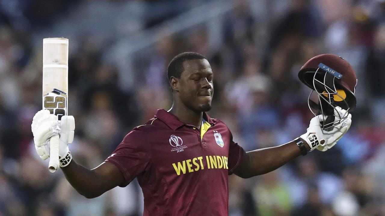 Carlos Brathwaite thumped a century against New Zealand. Photo: Jon Super/AP Photo.