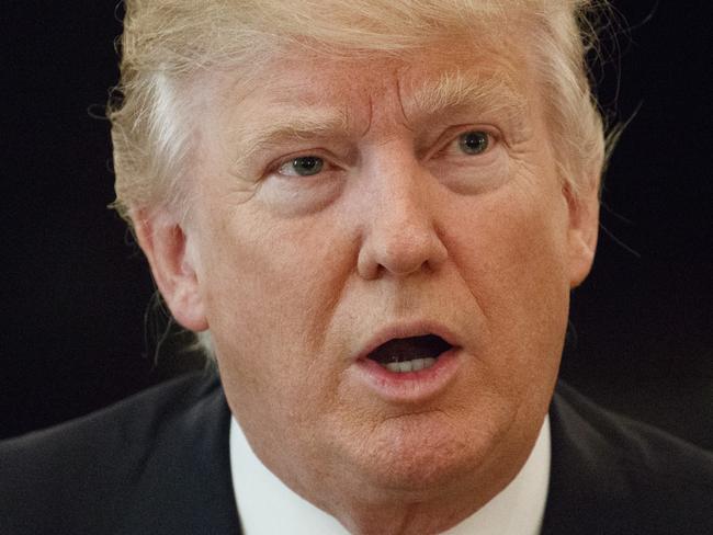 President Donald Trump speaks in the State Dining Room of the White House in Washington, Thursday, Feb. 9, 2017. For Trump the short walk between the Oval Office and the White House residence is so far a lonely existence. First lady Melania Trump and the coupleâ€™s 10-year-old son, Barron, are staying in New York at least until the end of the school year. (AP Photo/Evan Vucci)