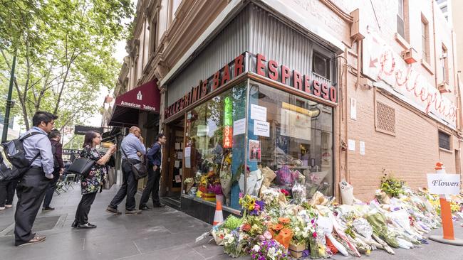 Customers drink coffee inside Pellegrini's Espresso Bar as it reopened last Tuesday. Picture: AAP Image/Daniel Pockett