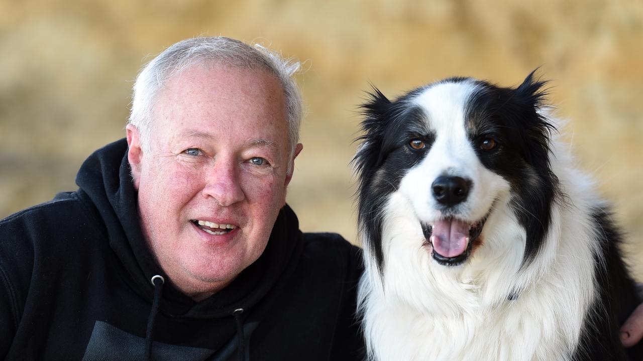 Jan Juc resident Michael Forkgen with his border collie Marlo. Picture: David Smith