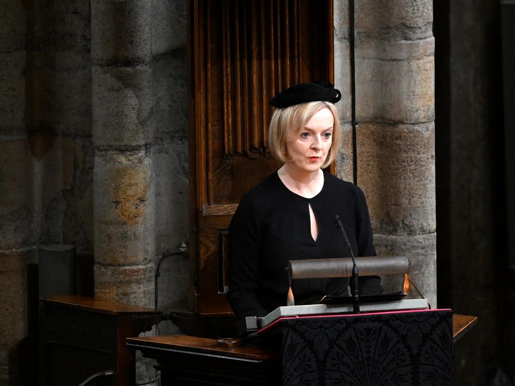 Prime Minister of the United Kingdom, Liz Truss speaks inside Westminster Abbey.