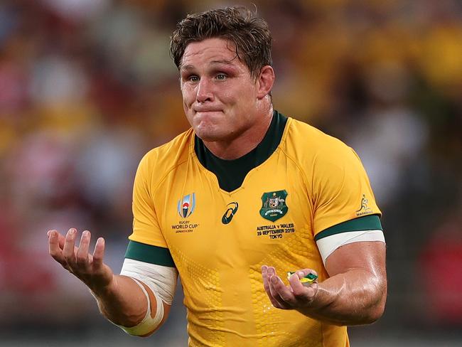 CHOFU, JAPAN - SEPTEMBER 29:  Michael Hooper of Australia talks with Referee, Romain Poite during the Rugby World Cup 2019 Group D game between Australia and Wales at Tokyo Stadium on September 29, 2019 in Chofu, Tokyo, Japan. (Photo by Dan Mullan/Getty Images)