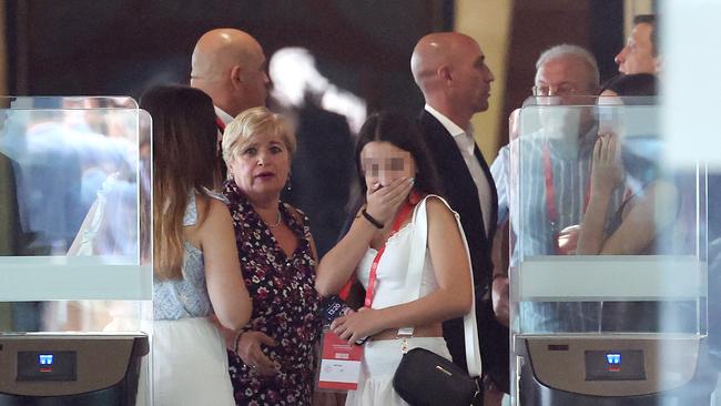 Luis Rubiales, centre, and his mother Angeles Bejar, in Madrid. Picture: AFP