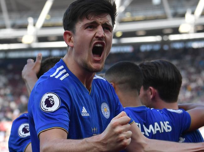 Leicester City's English defender Harry Maguire celebrates during the English Premier League football match between West Ham United and Leicester City at The London Stadium, in east London on April 20, 2019. (Photo by Ben STANSALL / AFP) / RESTRICTED TO EDITORIAL USE. No use with unauthorized audio, video, data, fixture lists, club/league logos or 'live' services. Online in-match use limited to 120 images. An additional 40 images may be used in extra time. No video emulation. Social media in-match use limited to 120 images. An additional 40 images may be used in extra time. No use in betting publications, games or single club/league/player publications. /