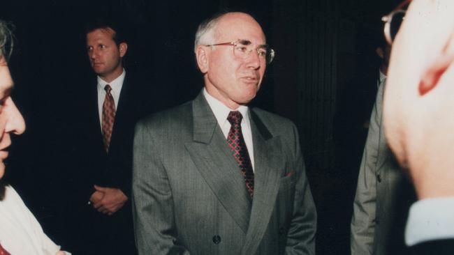 David Craig protecting the Prime Minister of Australia at the time, John Howard. Picture: Supplied