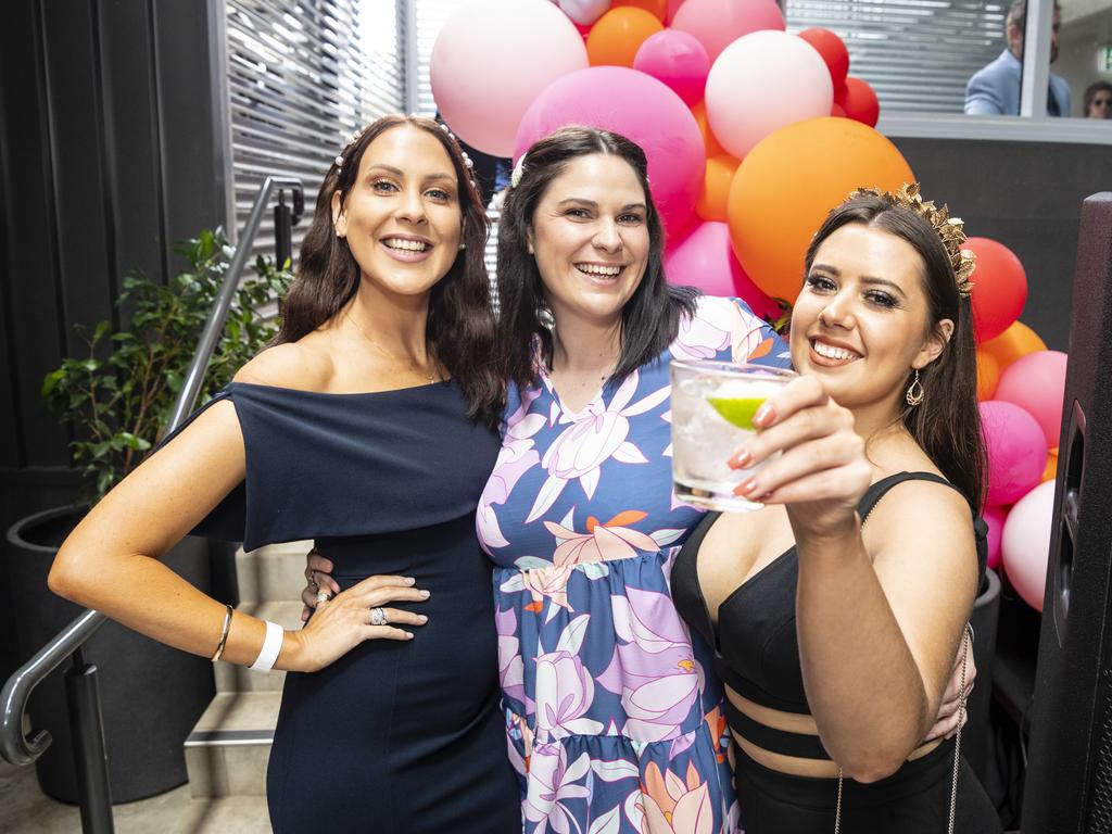 At the Melbourne Cup party at The Rock are (from left) Holly Leitch, Bianca Flanagan and Breanna Boardman, Tuesday, November 1, 2022. Picture: Kevin Farmer