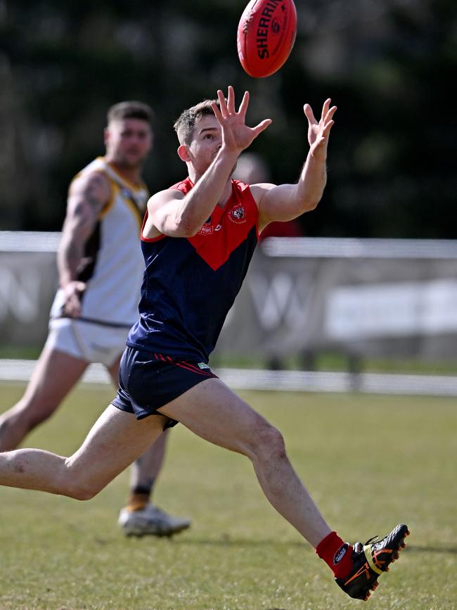 Diamond Creek’s Thomas Bennett marks. Picture: Andy Brownbill