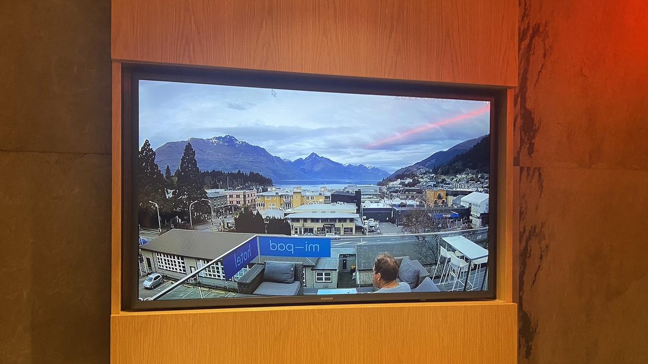 A room with a view: Genius or cheeky, one budget Queenstown hotel has come up with a way to make lake views more affordable. Picture: Twitter/MiriamMoore