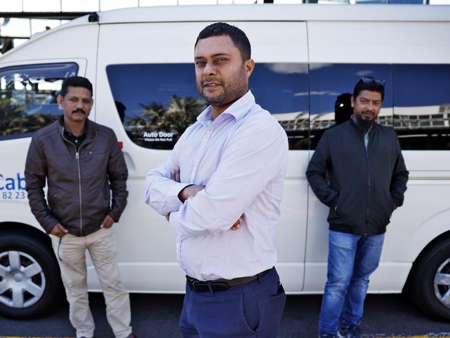 DAILY TELEGRAPH - 17/9/24Unhappy taxi drivers pictured at Sydney International Airport where UBER will soon have a dedicated stand. L to R,  Amer Akhtar, Deepak Malhotra and MD Haque. Picture: Sam Ruttyn